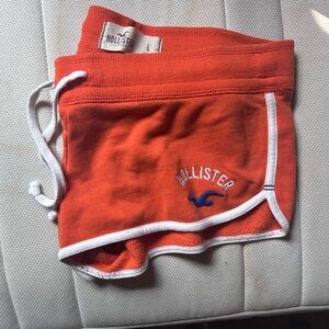 Low Rise Hollister Bright Orange Shorts with White Drawstring